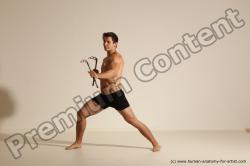 Underwear Fighting with axe Man White Muscular Short Brown Dynamic poses Academic